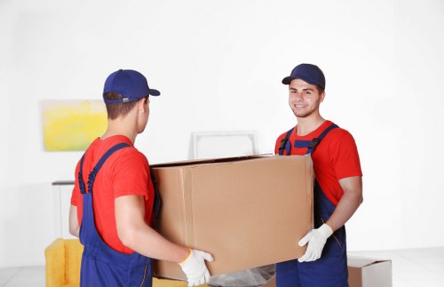Retail and workspace items being loaded for a commercial removal