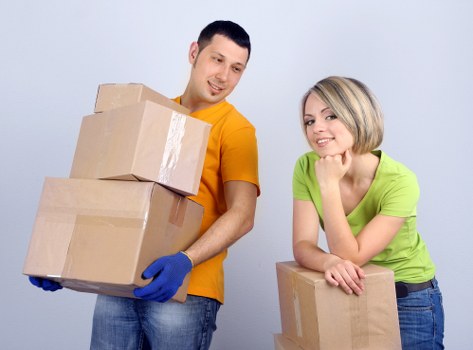 Packed boxes and furniture ready for Deptford house removals