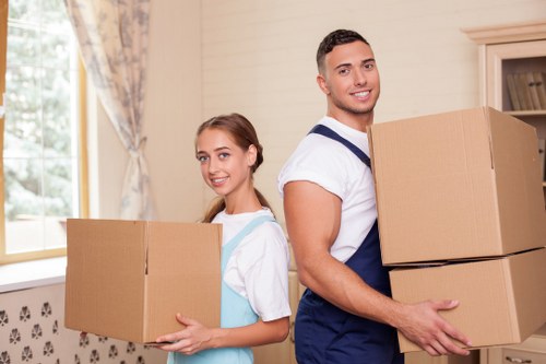 Packed boxes and wrapped furniture ready for a Deptford apartment move