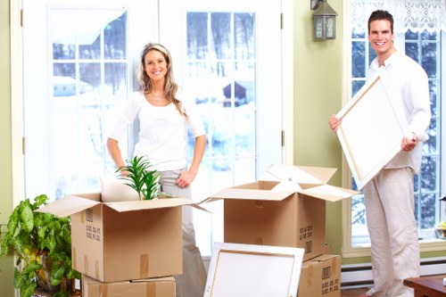 Packed furniture ready for collection during a Deptford removal service