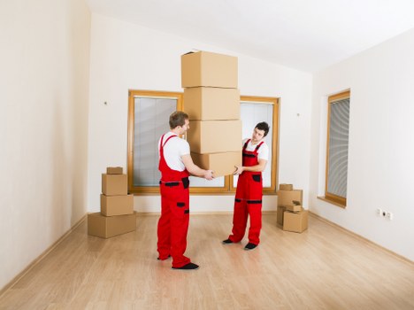 Team lifting items safely during a move